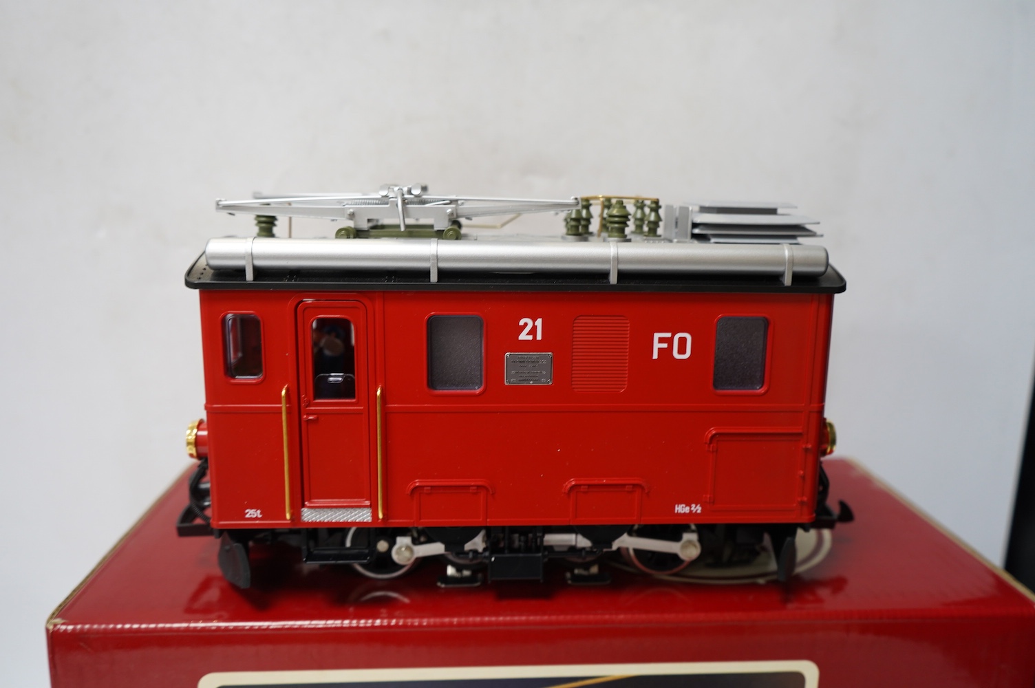 A boxed Lehman LGB (2046) G scale railway FO electric pantograph locomotive, 21, in red livery. Condition - good, evidence of very minor running wear only.